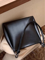 Structured PU leather shoulder bag laying down
