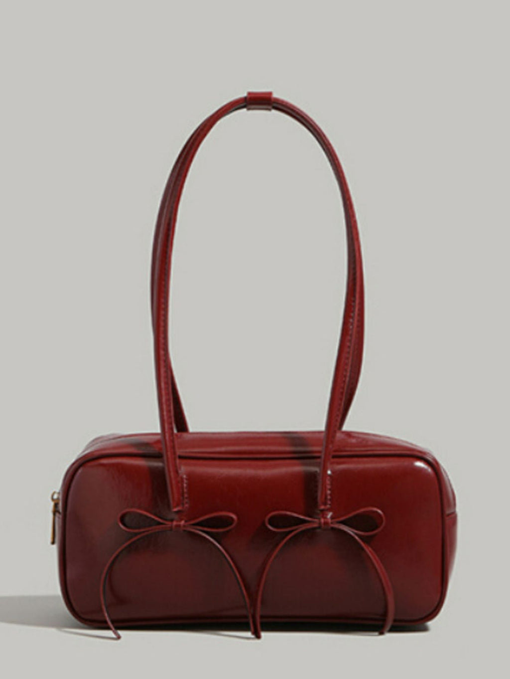 Bow decor shoulder bag with front bow detail structured shape front view