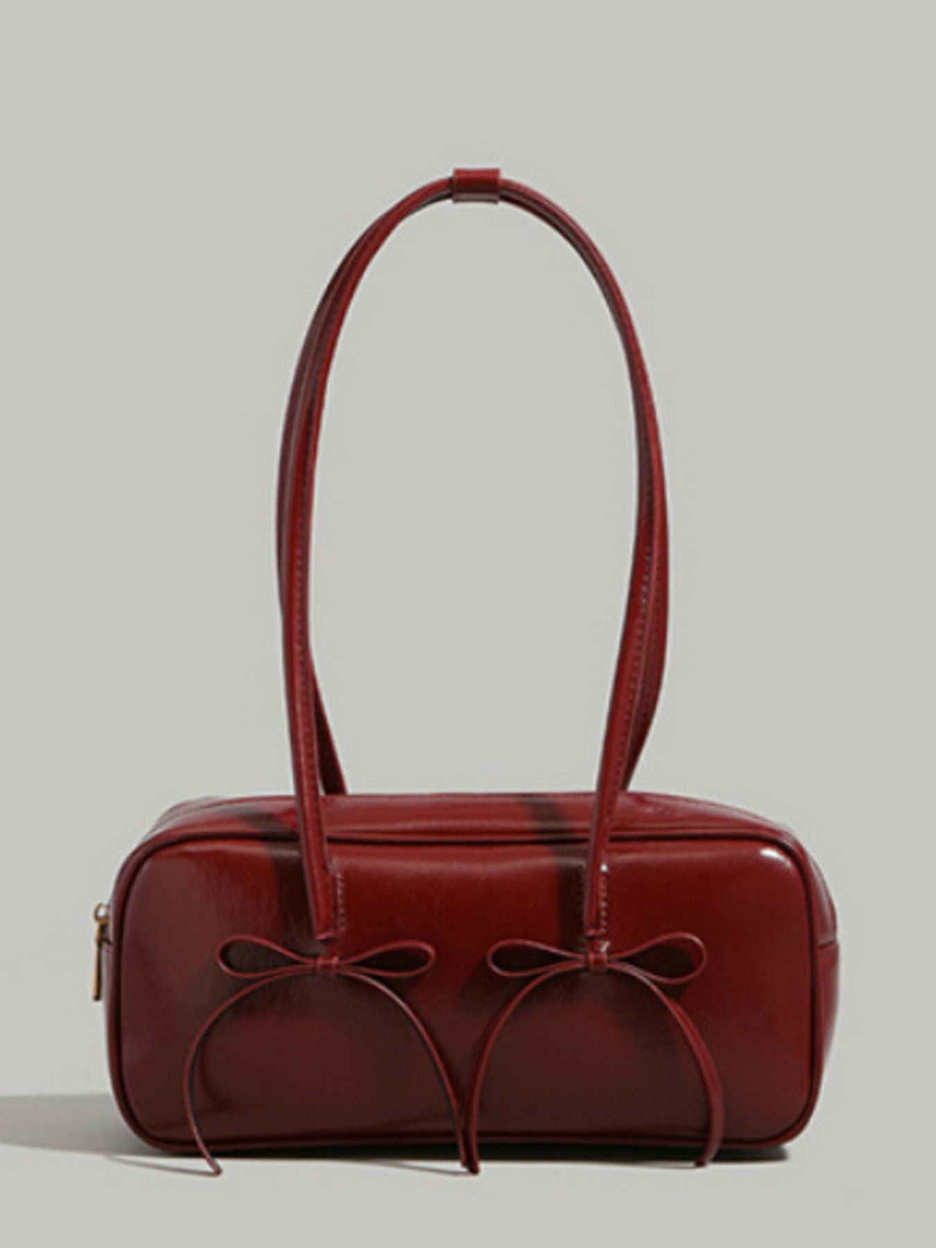 Bow decor shoulder bag with front bow detail structured shape front view