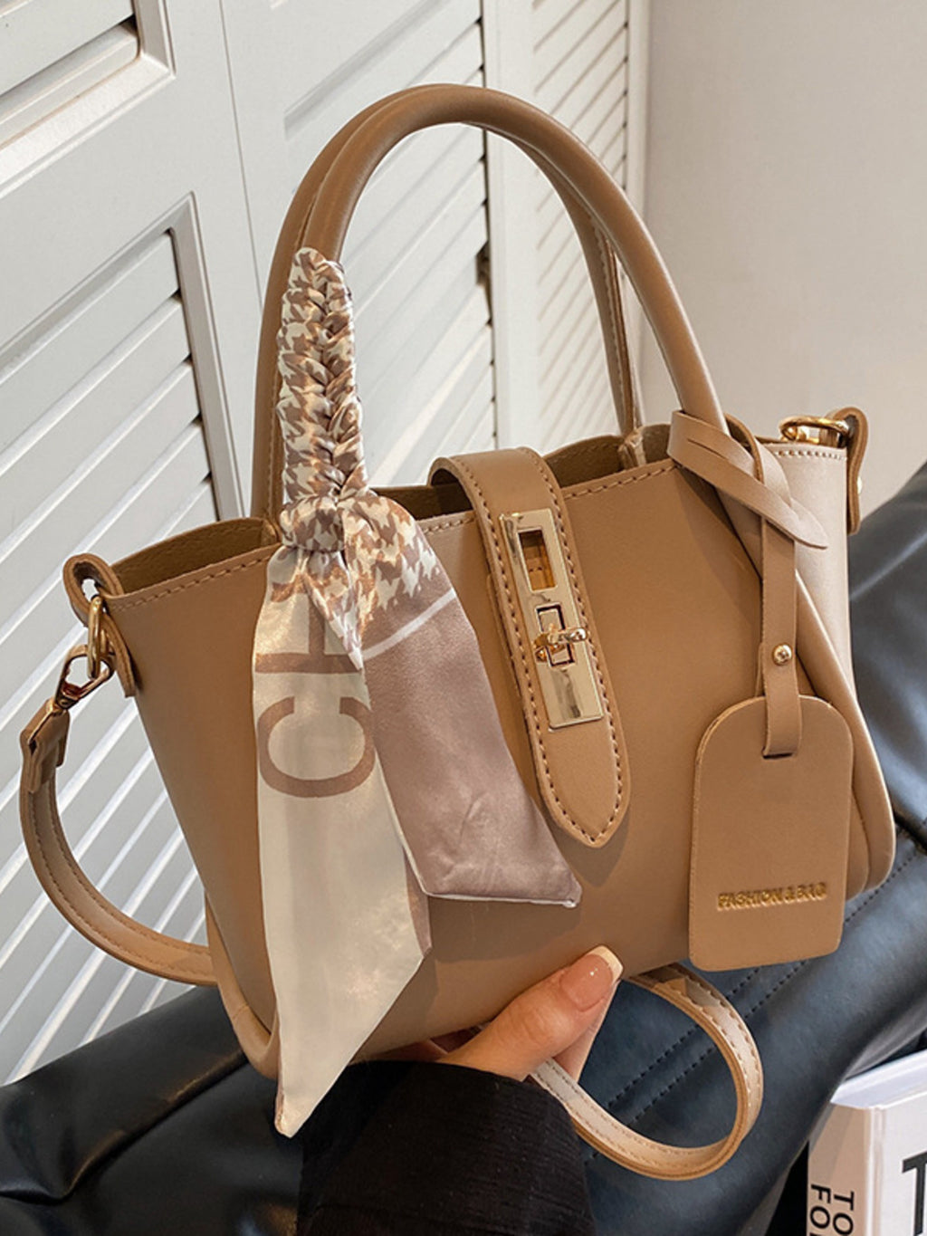 Structured mini satchel crossbody in khaki in hand