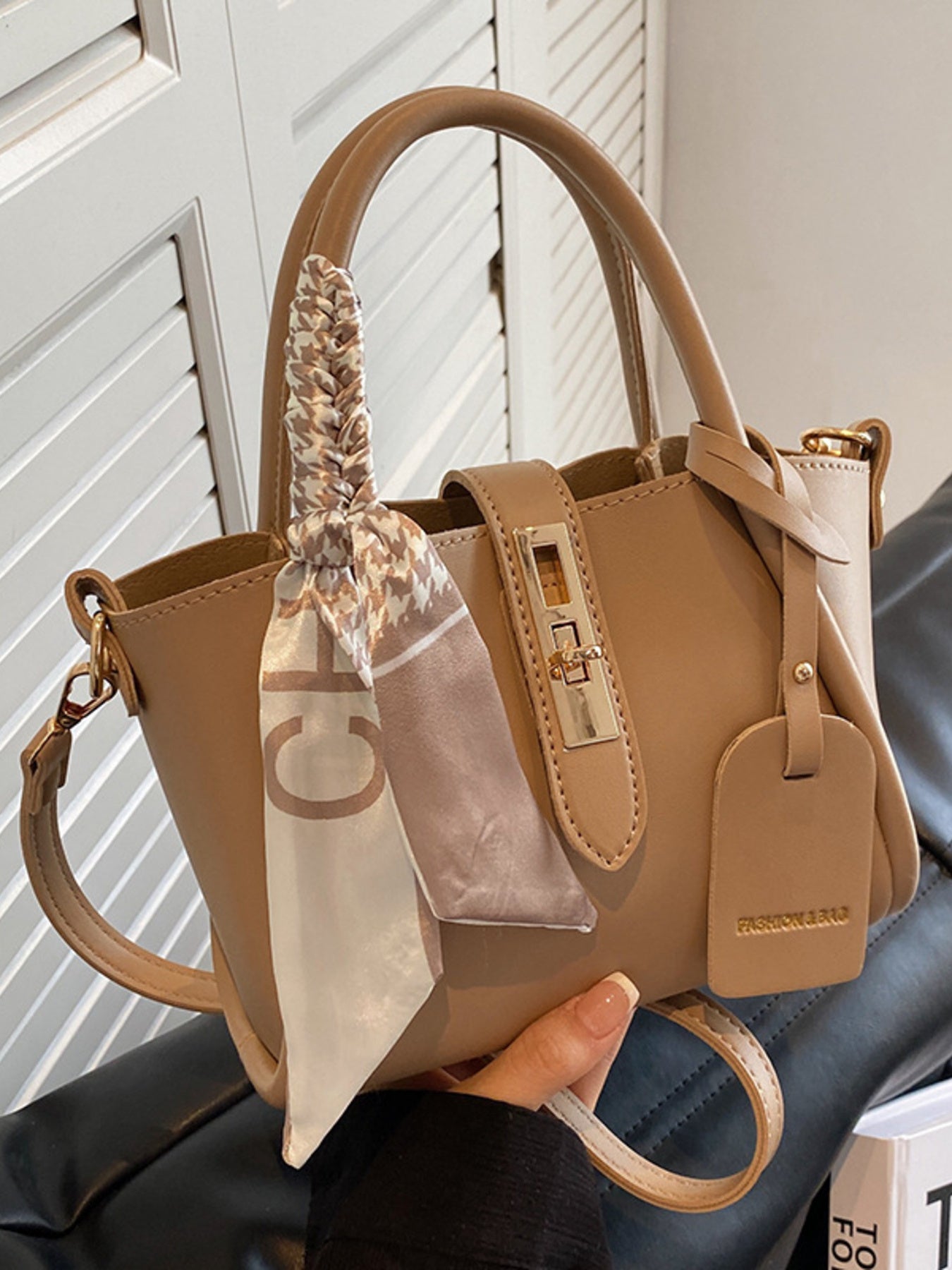 Structured mini satchel crossbody in khaki in hand