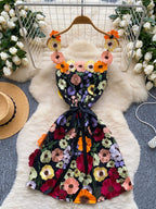 floral applique mini dress in black and orange front view waist tied