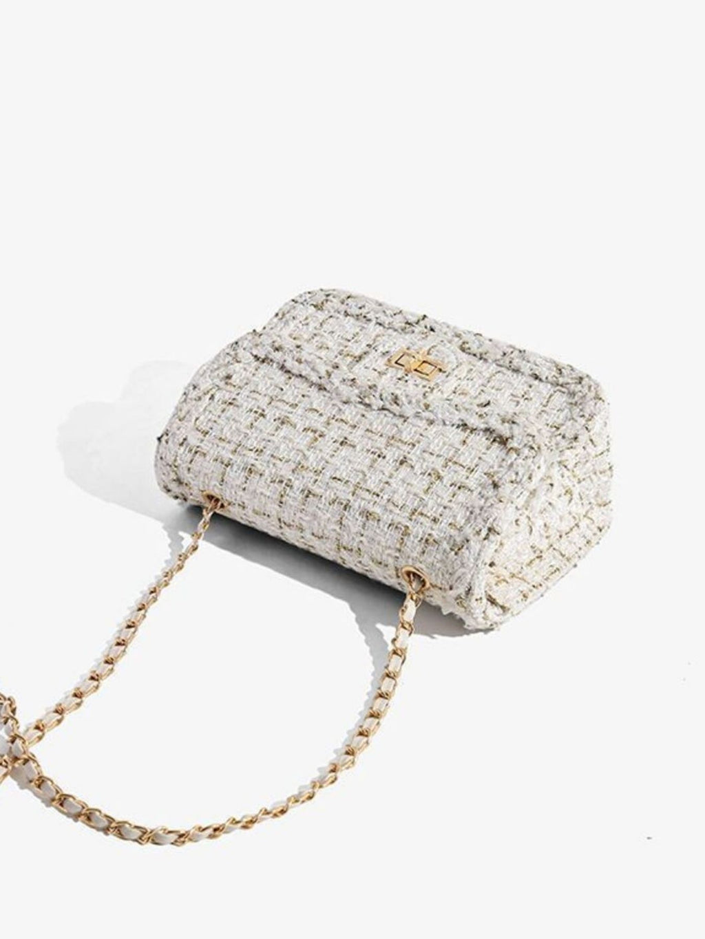 Classic tweed shoulder bag  laying down showing structure and thickness