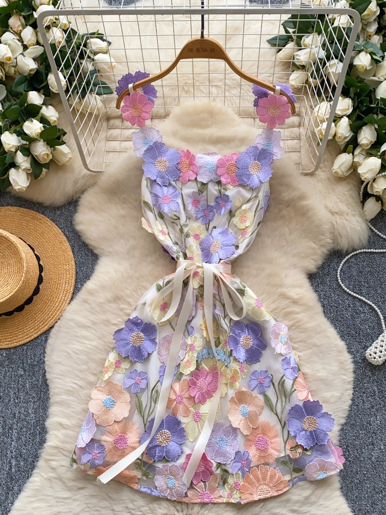 floral applique mini dress in purple apricot full front view waist tied with ribbon