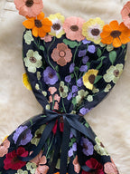floral applique mini dress in black and orange closer view of waist