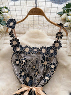 floral applique mini dress in lack and gold bodice and strap closer view