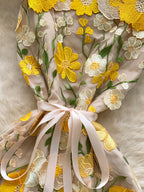 floral applique mini dress in yellow waist closeup