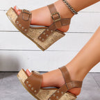 Open toe wedge sandals in brown closer view of side details