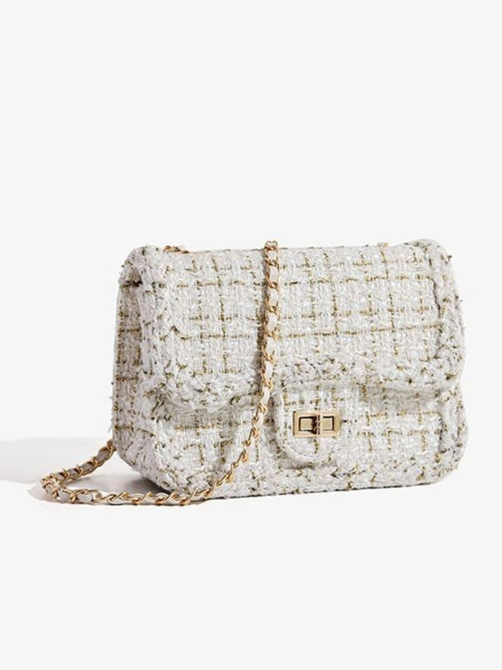 Classic tweed shoulder bag standing alone