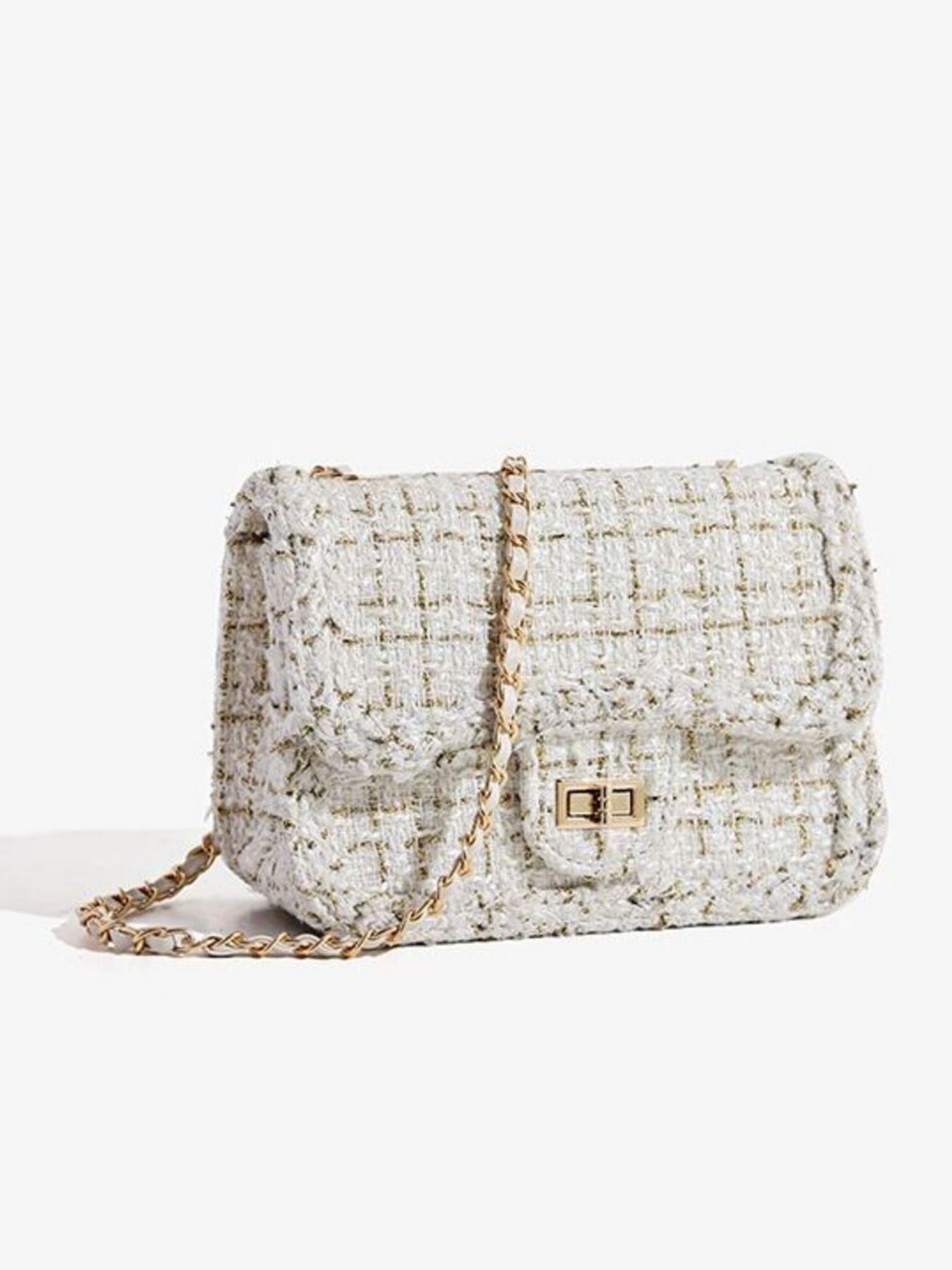 Classic tweed shoulder bag standing alone