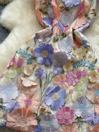 floral applique mini dress in purple apricot closer view of skirt