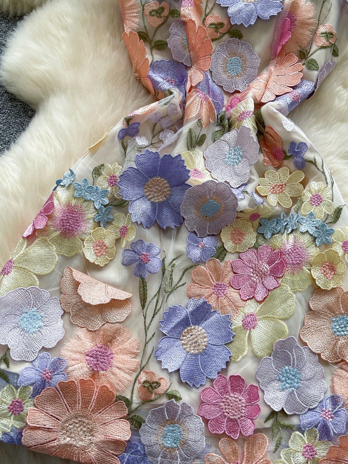 floral applique mini dress in purple apricot closer view of skirt