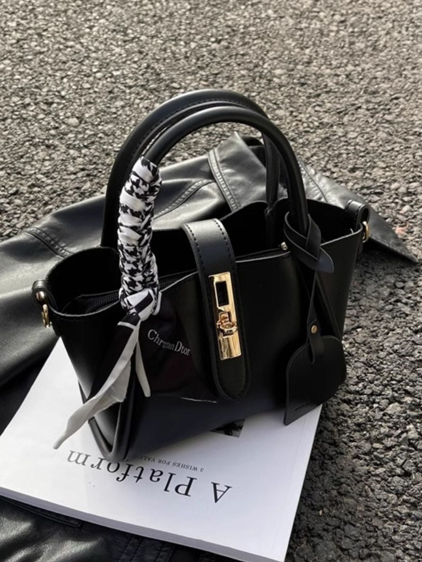 Structured mini satchel crossbody in black  standing up top and front view