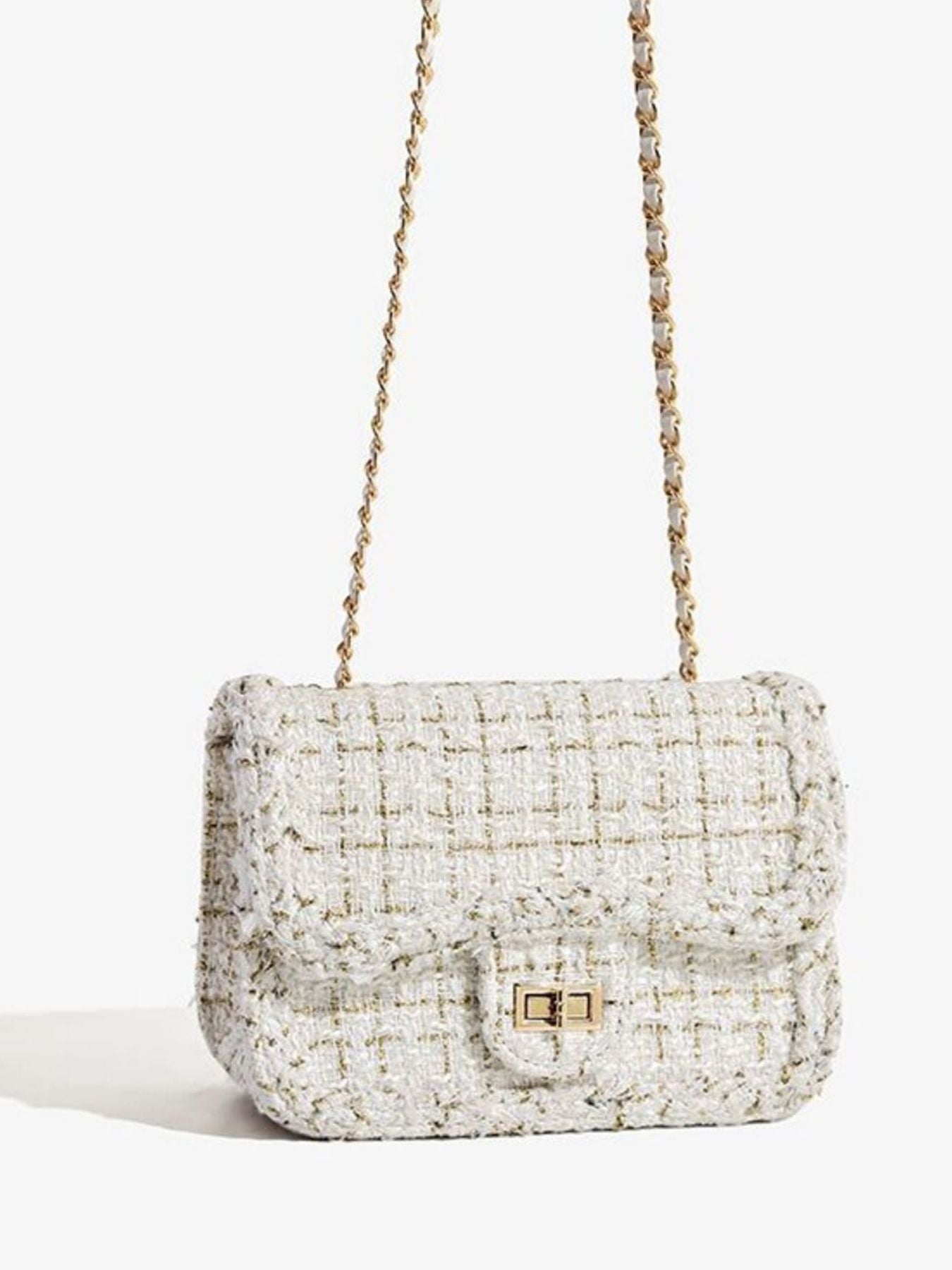 Classic tweed shoulder bag showing chain strap