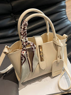 Structured mini satchel crossbody in ivory standing up top view