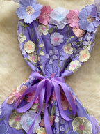 floral applique mini dress in purple waist closeup