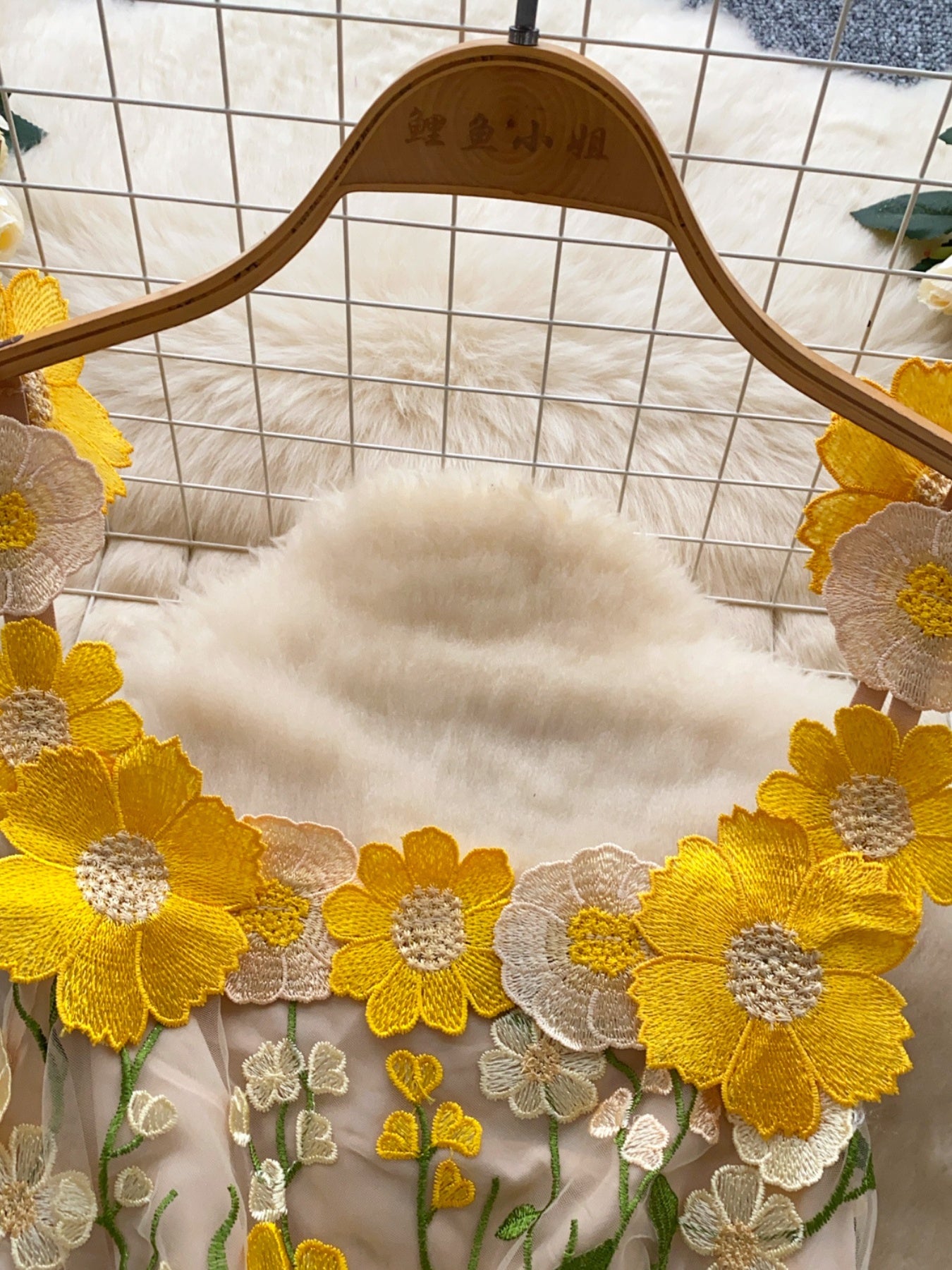 floral applique mini dress in yellow bodice and strap closeup
