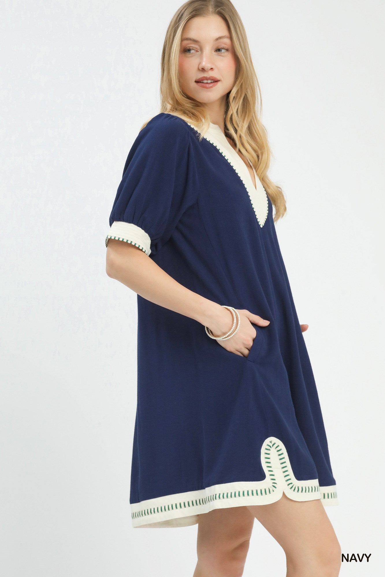 linen contrast trim dress side view hands in pockets