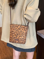 Leopard print crossbody bag on back front view