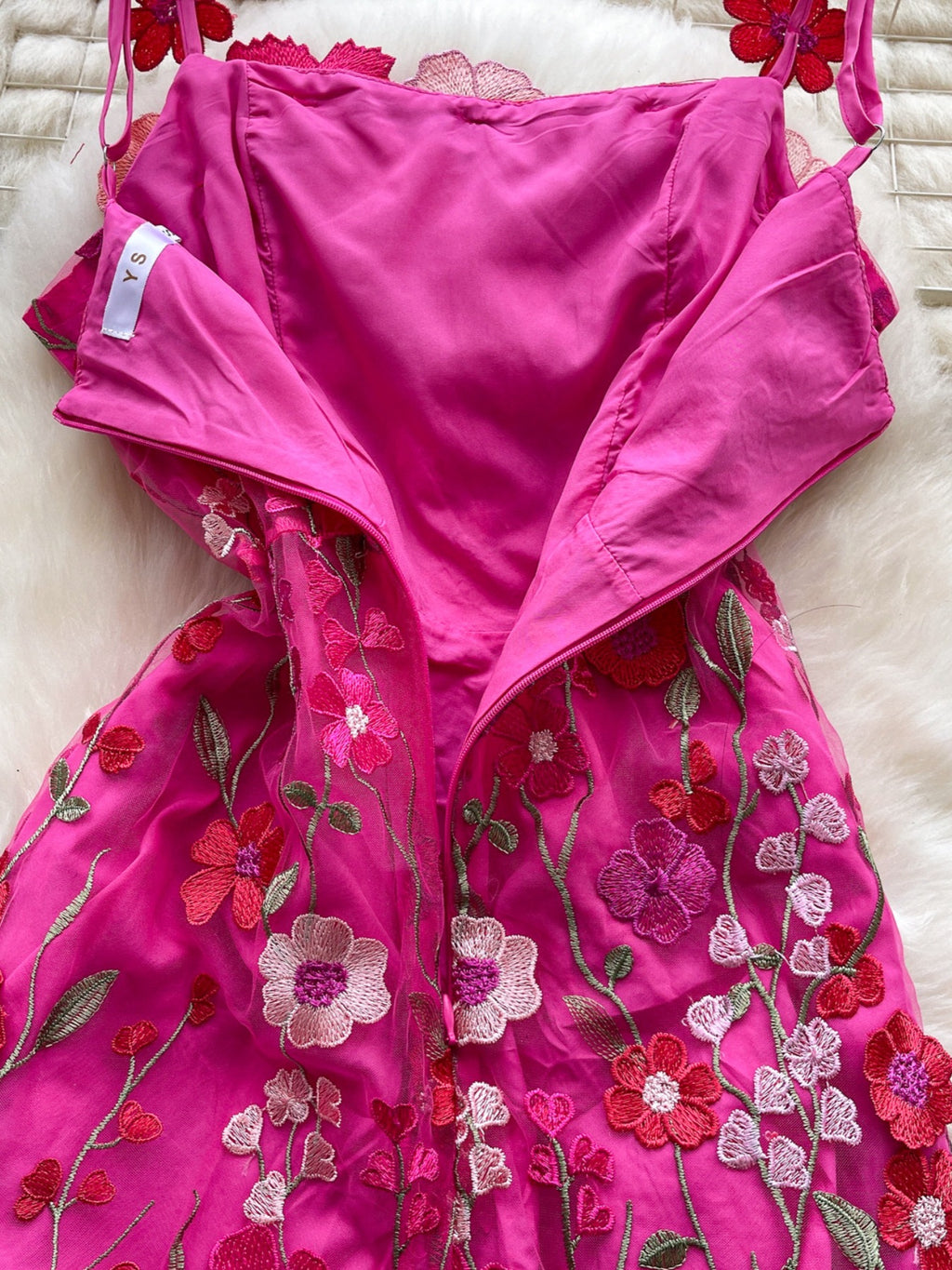 floral applique mini dress in rose red back view zipper open shows lining