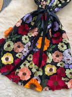 floral applique mini dress in black and orange full skirt view 