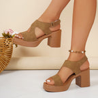 open toe block heel sandals in brown side view one elevated