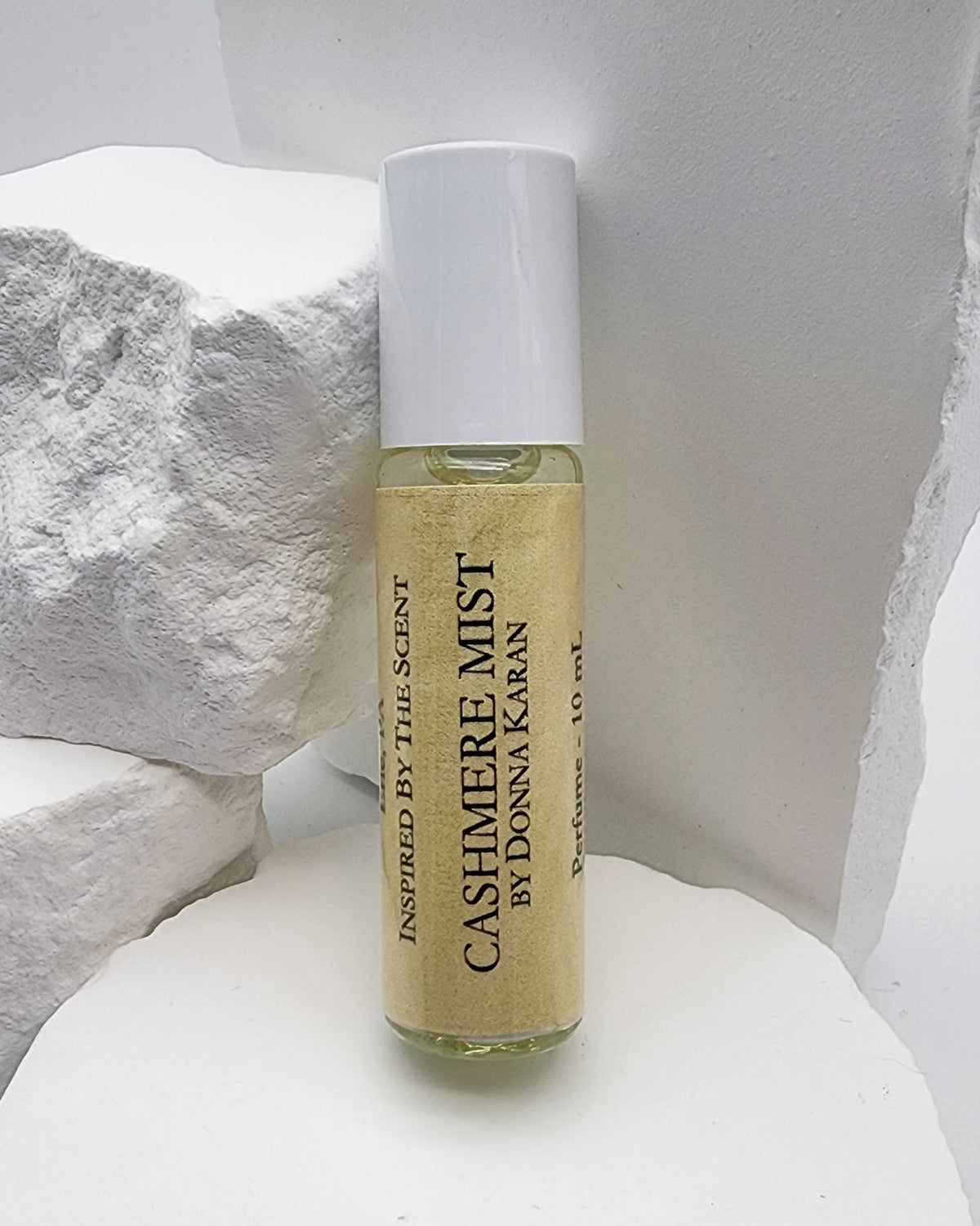 Perfume en roll-on Cashmere Mist