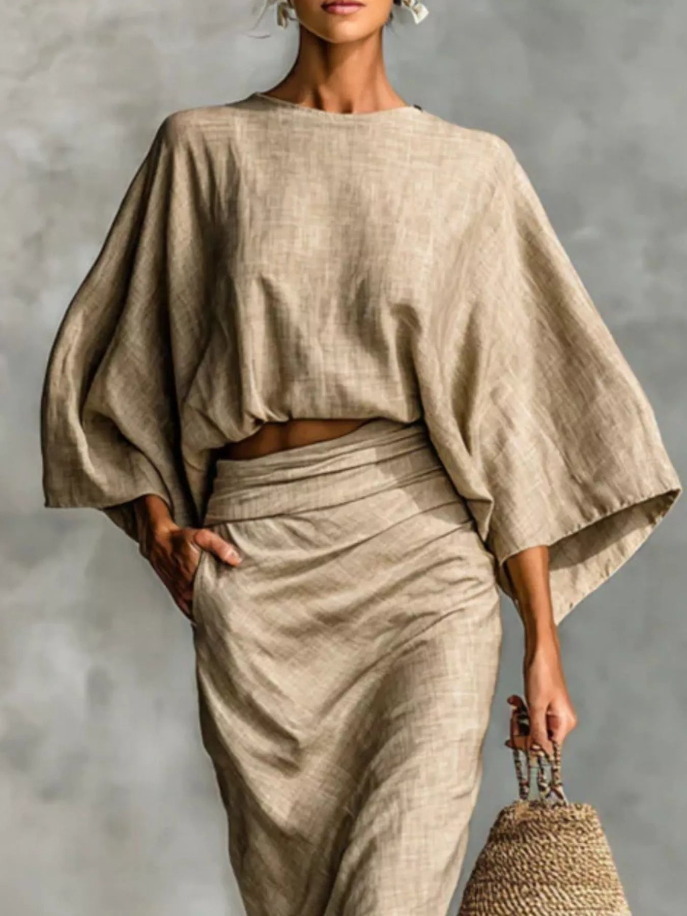 Kimono sleeve top and ruched skirt set in tan showing fabric texture and draped detail