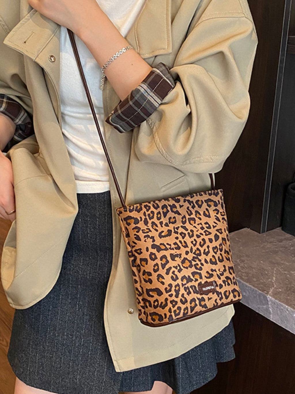 Leopard print crossbody bag slung crossbody shows front