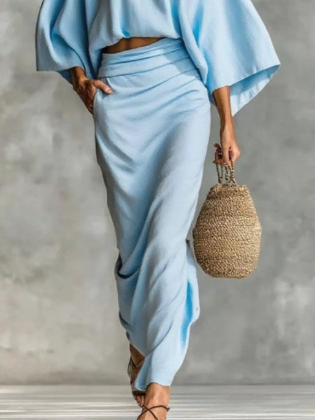 Ruched skirt in light blue featuring gathered detail and soft drape