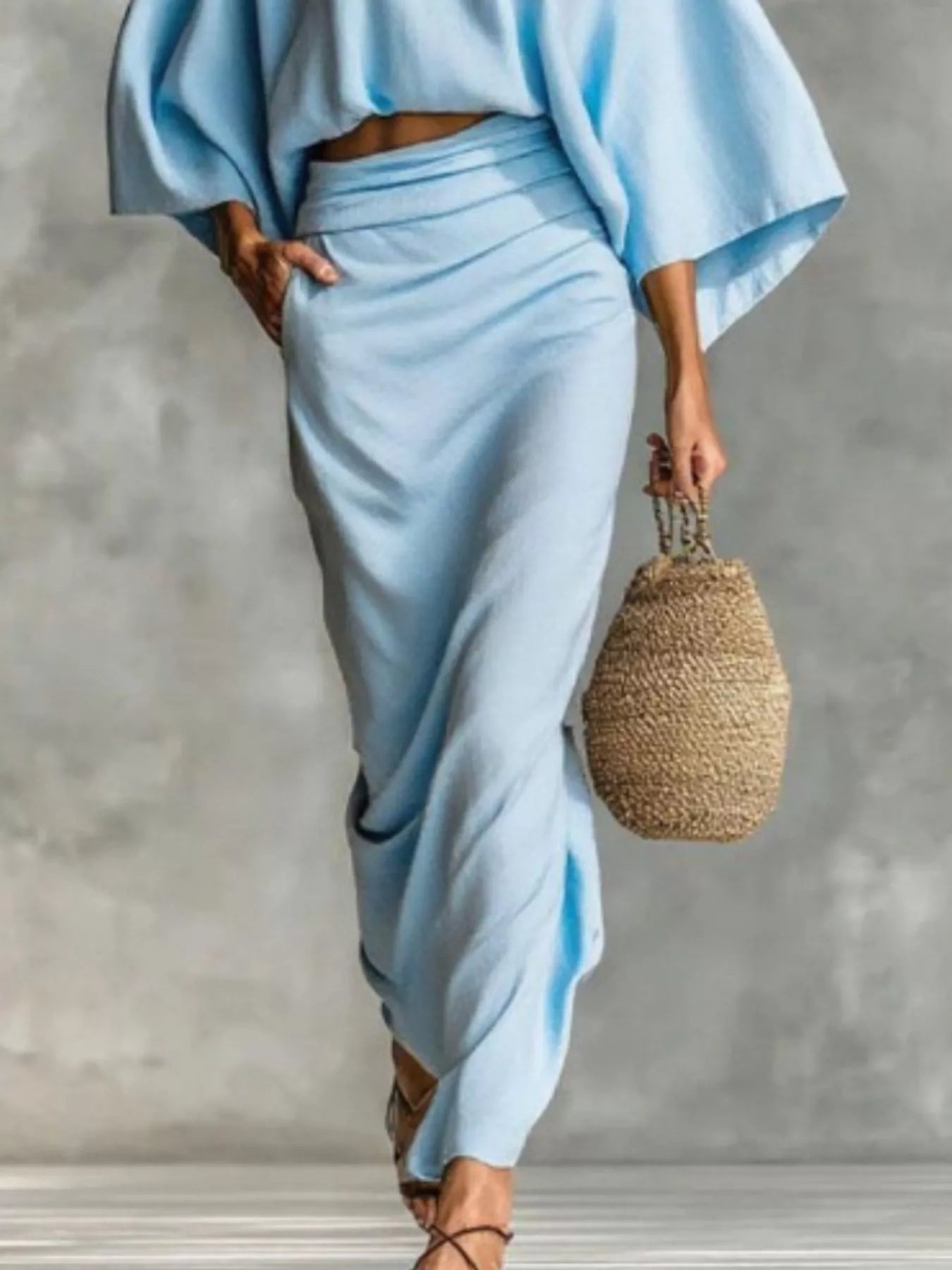 Ruched skirt in light blue featuring gathered detail and soft drape